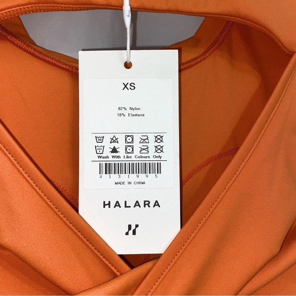 Halara Orange Twisted Cut Out Flare Mini Dance Active Short Sleeve Dress - Picture 7 of 9